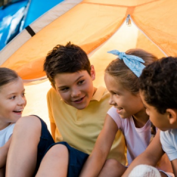 kids playing in a tent